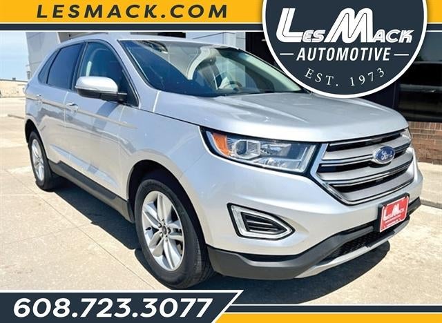 2016 Ford Edge SEL in Silver — front three-quarter view